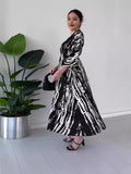 Fashion Prints In The Summer Of 2024 V-Neck Vacation Comfort Loose Dress